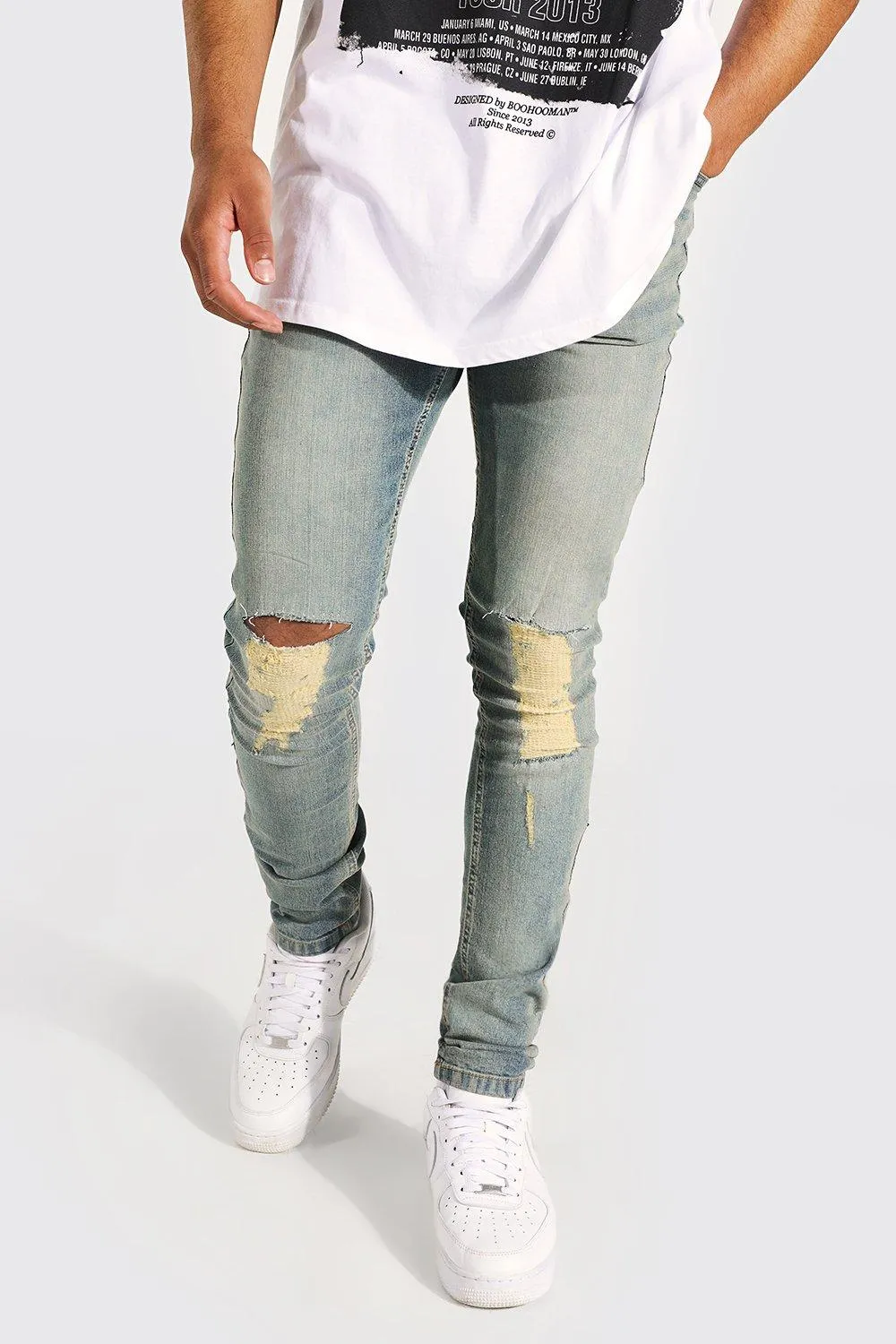 Tall Skinny Stretch Jeans mit Riss am Knie
